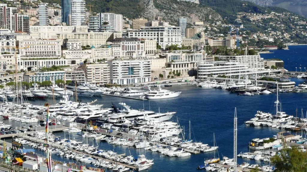 Monaco cityscape with harbor filled with yachts